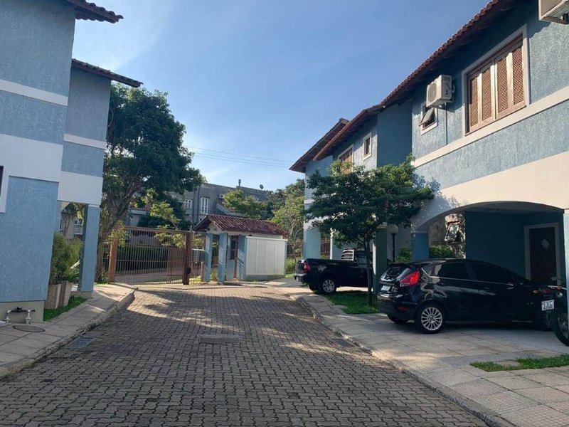 Casa em condomínio fechado próximo ao Barra Shopping Sul Upamaroti Porto Alegre - 