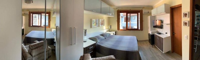 Casa em condomínio fechado próximo ao Barra Shopping Sul Upamaroti Porto Alegre - 