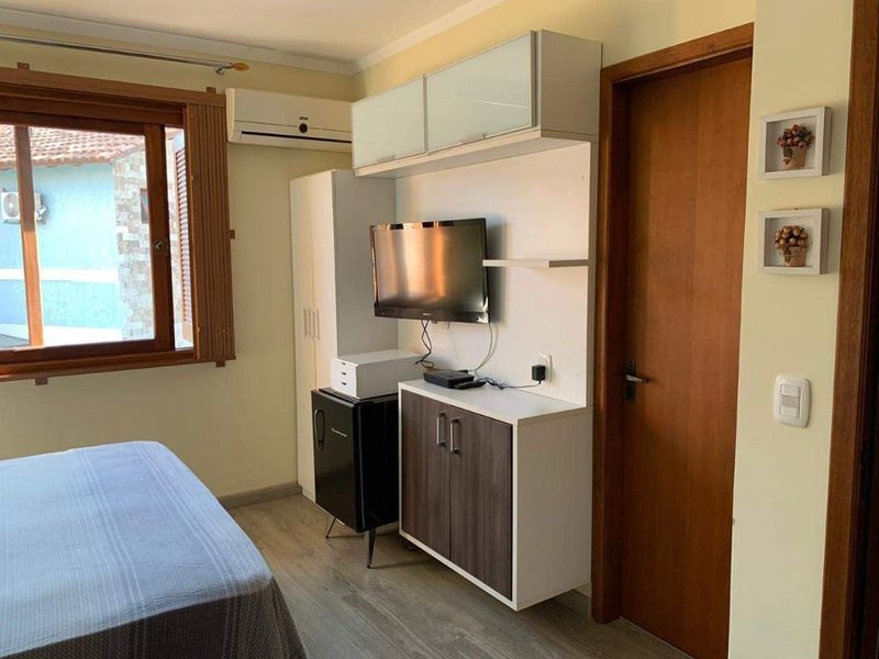 Casa em condomínio fechado próximo ao Barra Shopping Sul Upamaroti Porto Alegre - 
