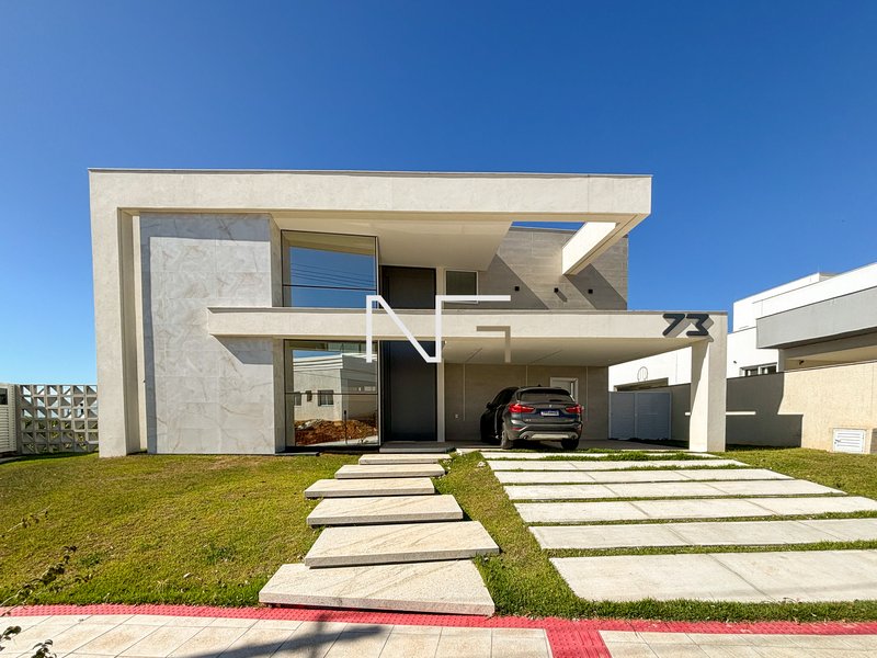 Linda casa 4 suítes no condominio Riviera Park Rua Paulo Cezar Vinha Vila Velha - 