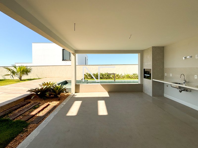 Linda casa 4 suítes no condominio Riviera Park Rua Paulo Cezar Vinha Vila Velha - 