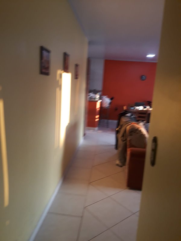 Casa com 3 quartos, 1 suíte, dois terrenos, a 3 quadras do mar. Frente Oeste Rua Irai Capão da Canoa - 