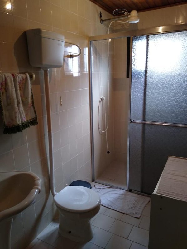 Casa 3 quartos, sendo 1 suíte, 2 vagas de garagem e pátio cercado em Curumim em Capão Rua Iuras Capão da Canoa - 