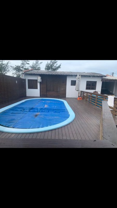Casa com 2 quartos, PISCINA, mesa de sinuca, na Praia do Barco em Capão da Canoa Rua Porto Alegre Capão da Canoa - 