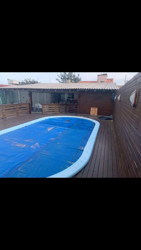 Casa com 2 quartos, PISCINA, mesa de sinuca, na Praia do Barco em Capão da Canoa Rua Porto Alegre Capão da Canoa - 