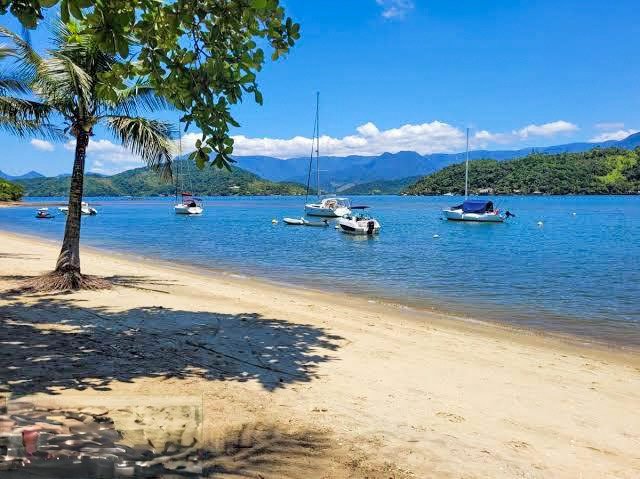 Casa encantadora localizada no condomínio Morada do Pontal, em Angra dos Reis - Angra dos Reis - 