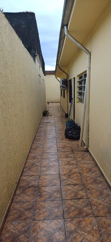 Casa Mobiliada de 03 Dormitórios e Suíte no Maracanã Praia Grande  Avenida Anita Barrella Praia Grande - 