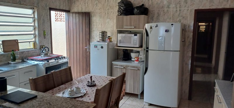 Casa Mobiliada de 03 Dormitórios e Suíte no Maracanã Praia Grande  Avenida Anita Barrella Praia Grande - 