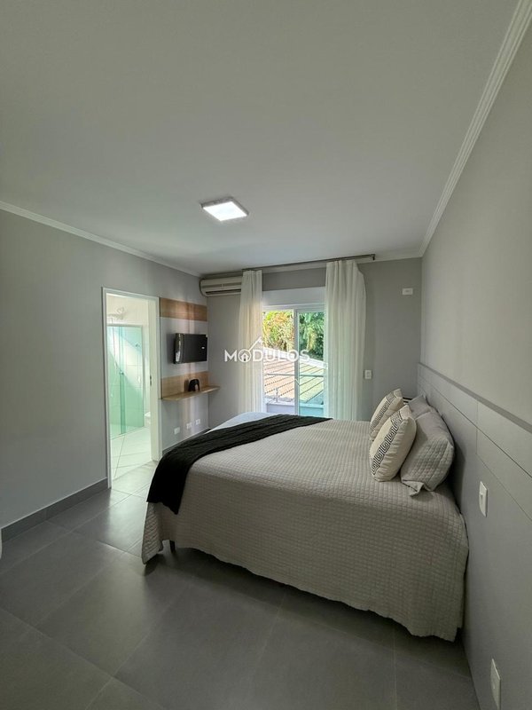 Propriedade minimalista em local nobre com 6 suítes  à venda, 470 m² por R$ 5.900.000,00 Passeio Carvalho Bertioga - 
