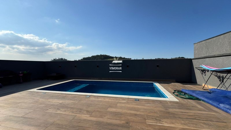 Sobrado em condomínio 3 dormitórios sendo 1 suíte + área gourmet com piscina - Santa Isabel - 
