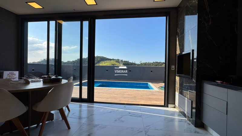 Sobrado em condomínio 3 dormitórios sendo 1 suíte + área gourmet com piscina - Santa Isabel - 