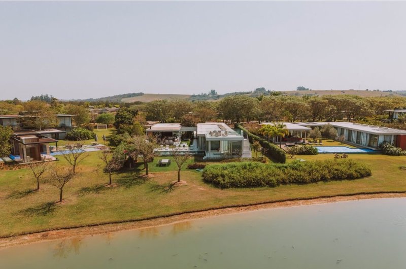 GLASS HAUS À VENDA – FAZ. BOA VISTA ✨ Um ícone de arquitetura contemporânea frente ao lago Alameda dos Pínus PORTO FELIZ - 