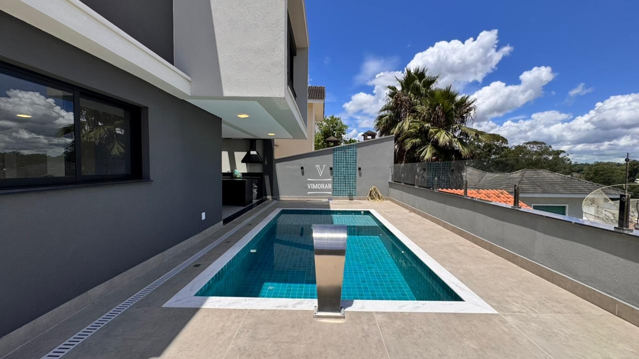 Casa em condom&iacute;nio 3 su&iacute;tes + &aacute;rea gourmet com piscina  Arujá - 