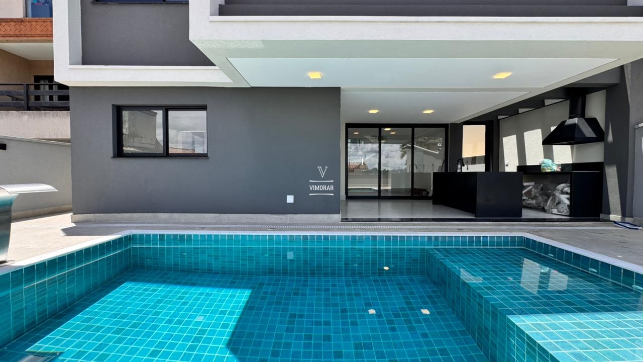 Casa em condom&iacute;nio 3 su&iacute;tes + &aacute;rea gourmet com piscina  Arujá - 