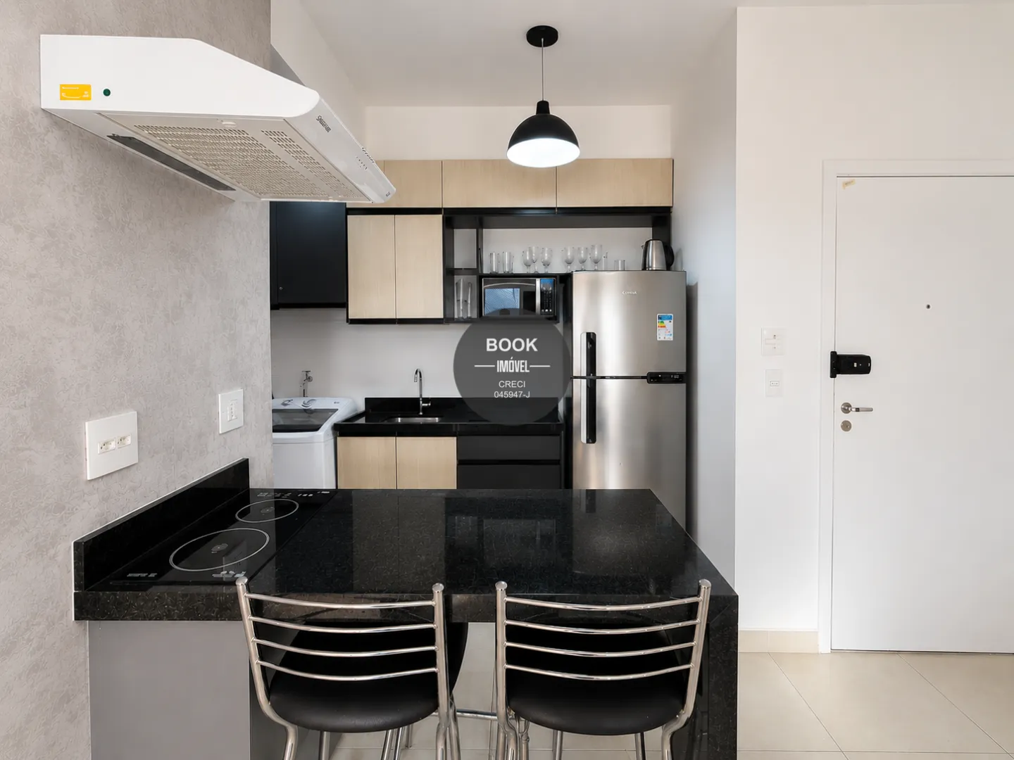 Apartamento moderno e integrado, com lazer completo e a poucos passos da praia Avenida Presidente Wilson Santos - 
