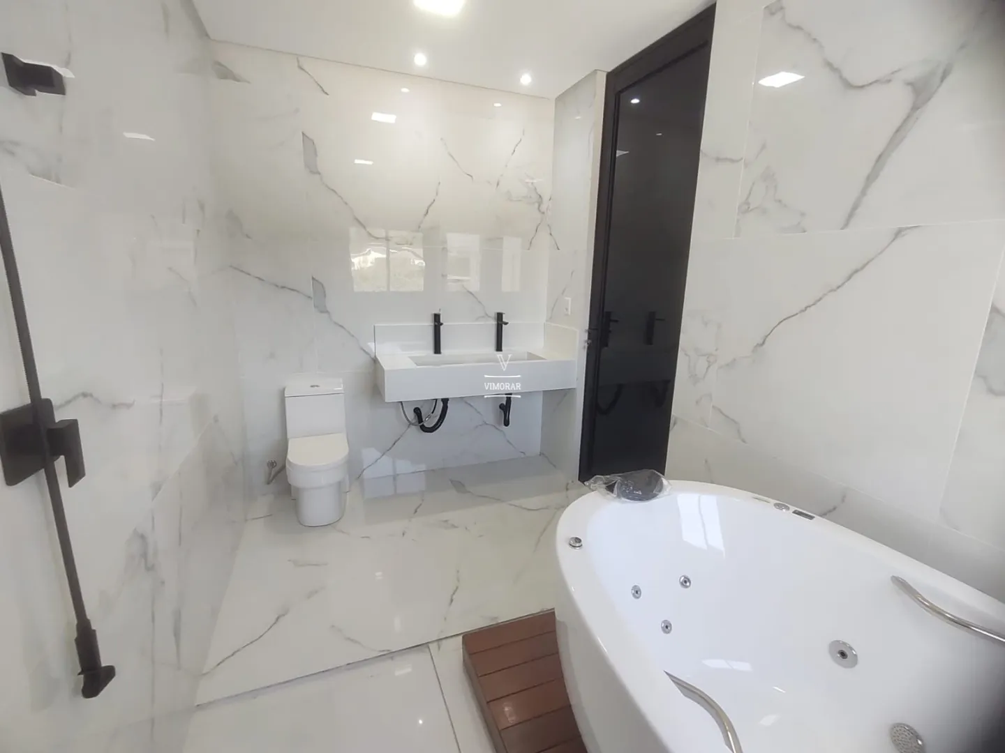 Casa em condom&iacute;nio 3 su&iacute;tes + 6 vagas de garagem  Arujá - 