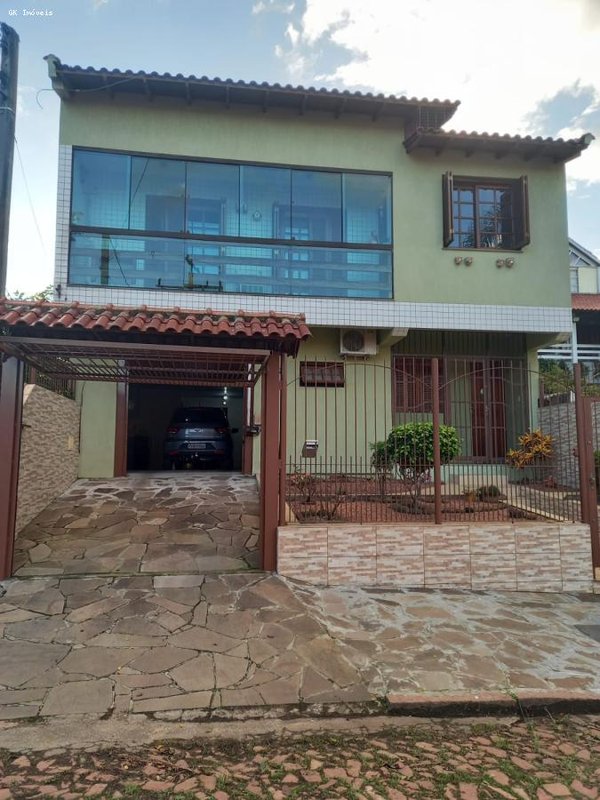 Casa 4 dormitórios ou + para Venda em Porto Alegre, Sarandi, 4 dormitórios, 1 suíte, 2 ban - Porto Alegre - 